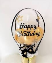 1 bubble clear balloon with happy birthday print on balloon and ferrero rocher chocolates box