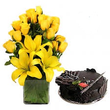 Yellow lilies arranged in a basket with 1 kg cake