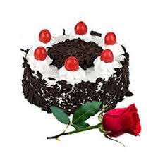 Six Red roses with 1/2 Kg Black Forest Cake