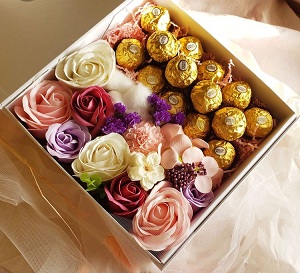 Roses in a box with ferrero