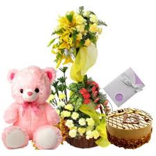 Lilies basket with roses 1/2 kg cake 1 feet teddy and card