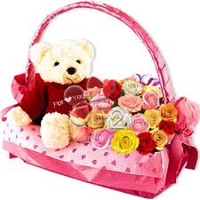 Flowers and teddy in same basket