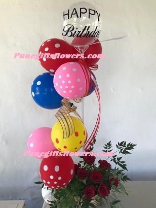 Polka dot balloons arrangement with roses and happy birthday balloon