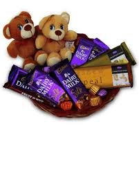 2 Teddies with 5 dairy milk Silk and 2 fruit and nut chocolates in same basket