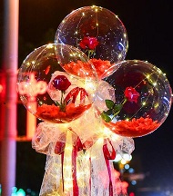 3 Red rose in 3 transparent balloon red white wrapping arrangement