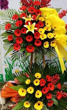 Gerberas and lilies orchids tall arrangement 3-4 feet