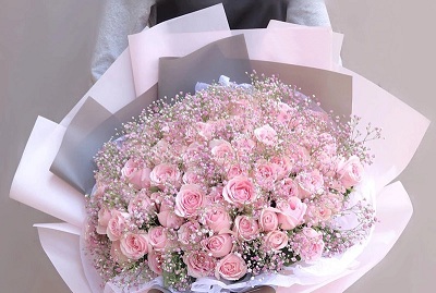 Life size tall flower bouquet with baby pink roses and babys breath