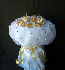 16 Ferreo rocher Chocolates Bouquet wrapped in White net decorated with white beads