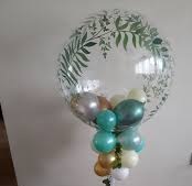 1 air bubble balloons with blue green golden balloons and leaf on balloon