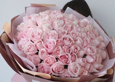 Life size tall flower bouquet with baby pink roses