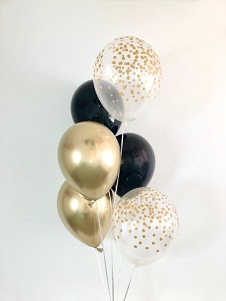 Clear and gold and black balloons on the sticks