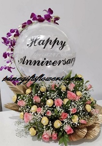 Transparent balloon with 16 ferrero and flowers with led and orchid on top for birthday or anniversary