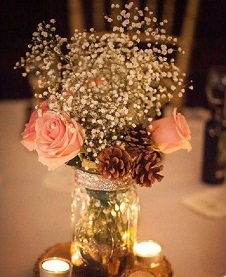 6 pink Roses in a mason jar with Led string lights and 2 tea lights