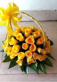 50 yellow roses in a basket