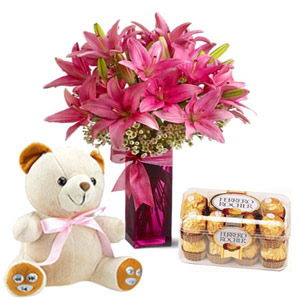 6 lilies vase, 16 ferrero chocolates, 6 inch teddy