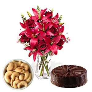 6 lilies vase, 200 gms cashews, 1 kg cake