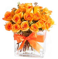 24 roses in a glass vase