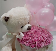 White or cream Teddy with pink roses in a box and 4 pink balloons