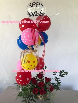 Polka dot balloons arrangement with roses and happy birthday balloon