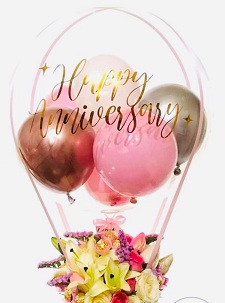 Happy anniversary transparent printed transparent balloon with 4 pink and red balloons and lilies roses arrangement