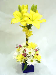 2 lilies with 12 gerberas vase