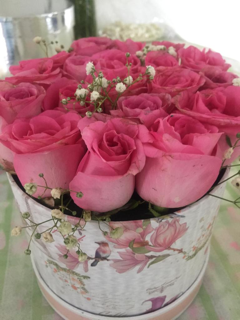 20 Pink Roses in a round silver box