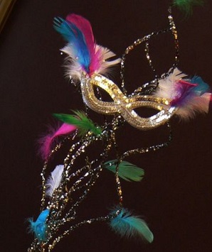 Gold Masque with feathers and led string lights for Masquerade party