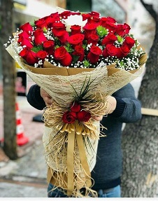 50 Red Roses Bouquet in Jute packing and raffia