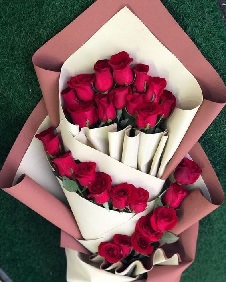 30 Red roses wrapped in layers with white and soft shade of pink paper which is also in layers