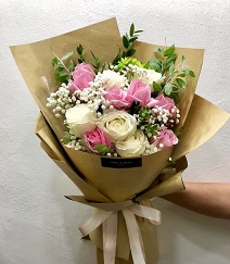 Pale and soft shades of pink and white 20 roses bouquet in brown wrapping