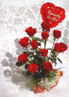 Valentine Special - 12 red roses in a basket with a heart